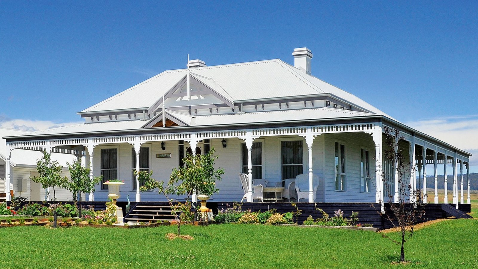 A White House Showing Classic Victorian Architectural Styles For Renovations